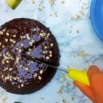 This delicious vegan zucchini chocolate cake has a great moist consistency without eggs and dairy, while is so easy to make. It's healthy, gluten-free, and allergy-friendly (dairy-free, egg-free, soy-free, corn-free, peanut-free, tree nut-free). Perfect for a birthday cake, or any other occasion. #chocolate #zucchini #chocolatecake #glutenfree #glutenfreedessert #dairyfree #healthydessert #easyrecipe #glutenfreedairyfree #dairyfree #eggfree #vegan #veganglutenfree