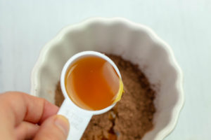 Adding Mapple Syrup to a bowl