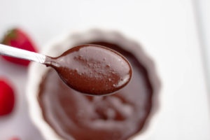 Vegan chocolate ganache on a teaspoon