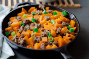 Ground Beef and Sweet Potato meal in an iron skillet