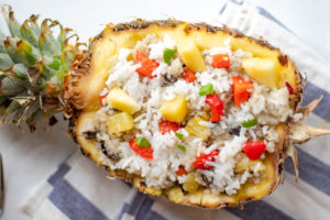 A pineapple stuffed with fried rice