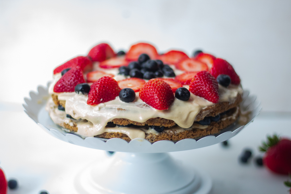 Gluten-free Vegan Vanilla Cake on a cake stand