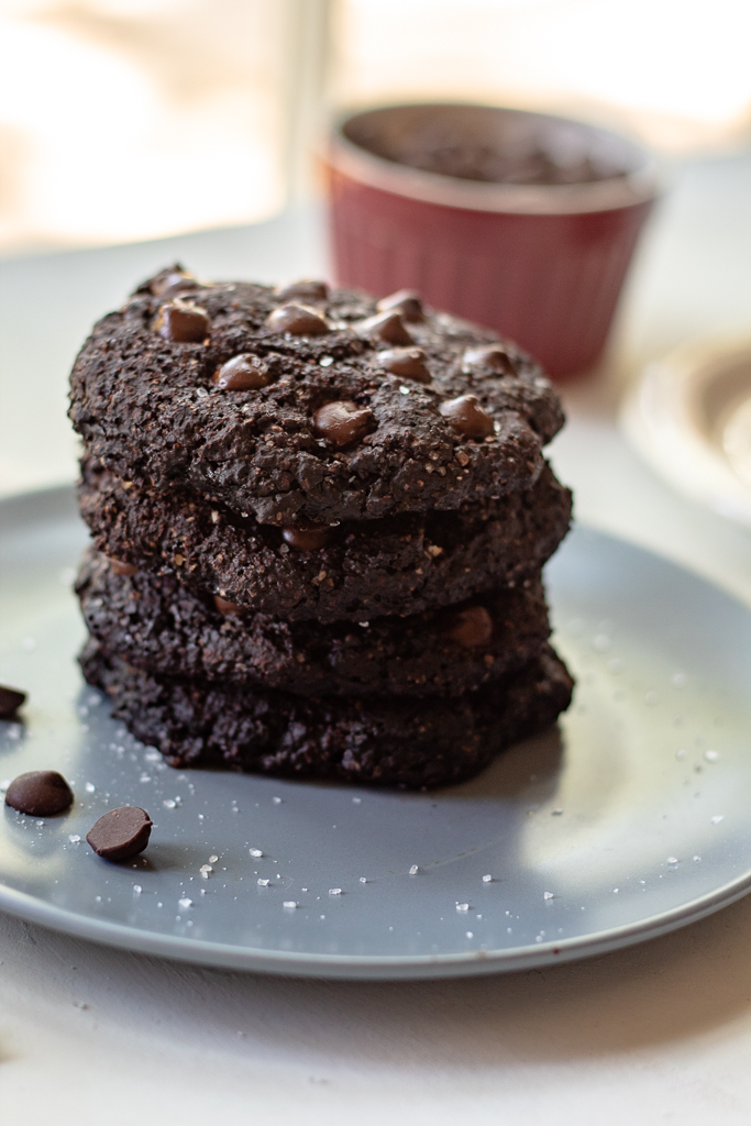 Three cookies stacked on a plate