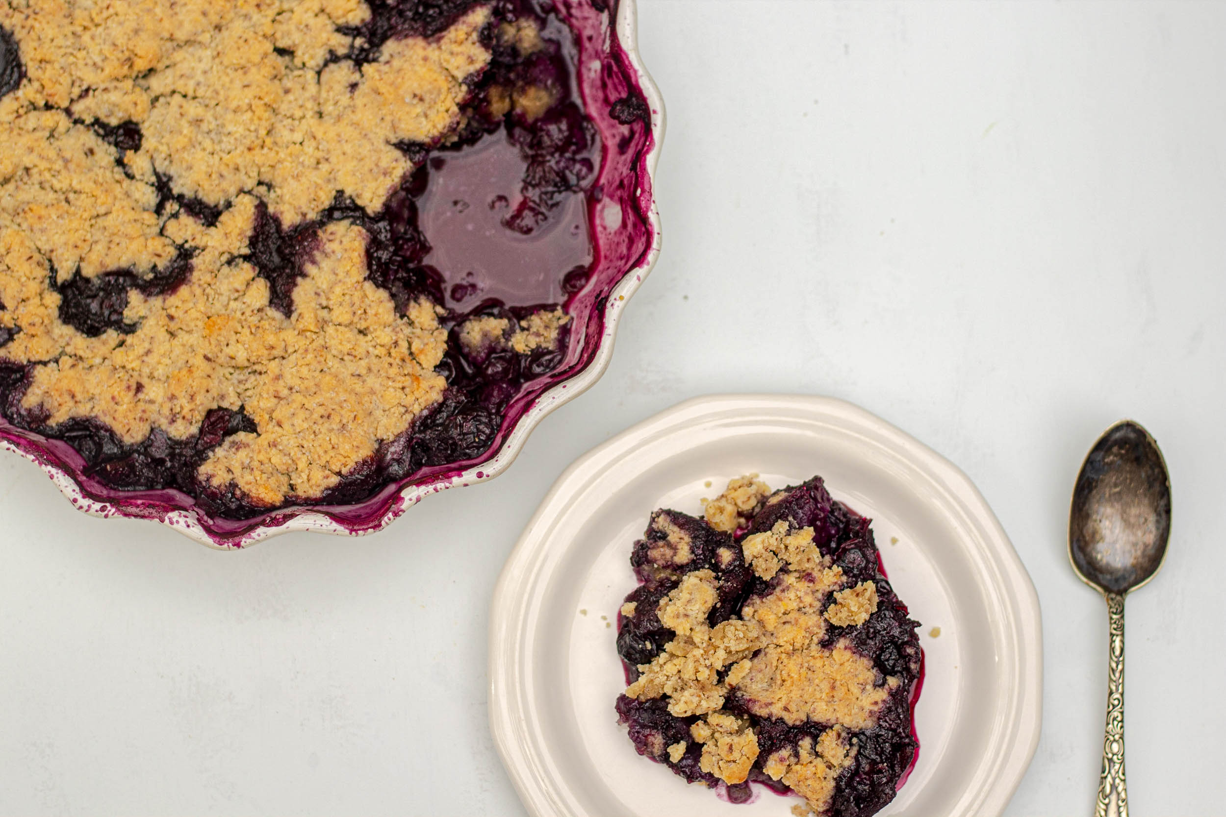 a piece of Gluten-free Blueberry Cobbler on a plate