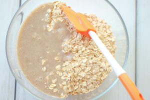 A bowl with oats and blended bananas for the Banana Cookies
