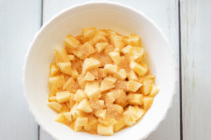 Cut up apples with sugar on them