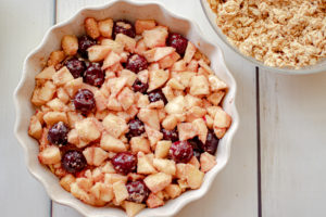 Apple and Cherry filling in a pie pan