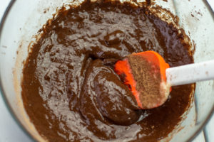 Mixing the maple syrup with the batter