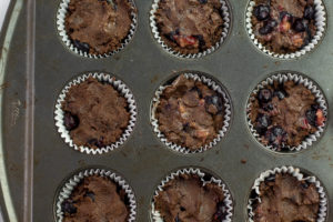 muffin pan with uncooked cupcakes
