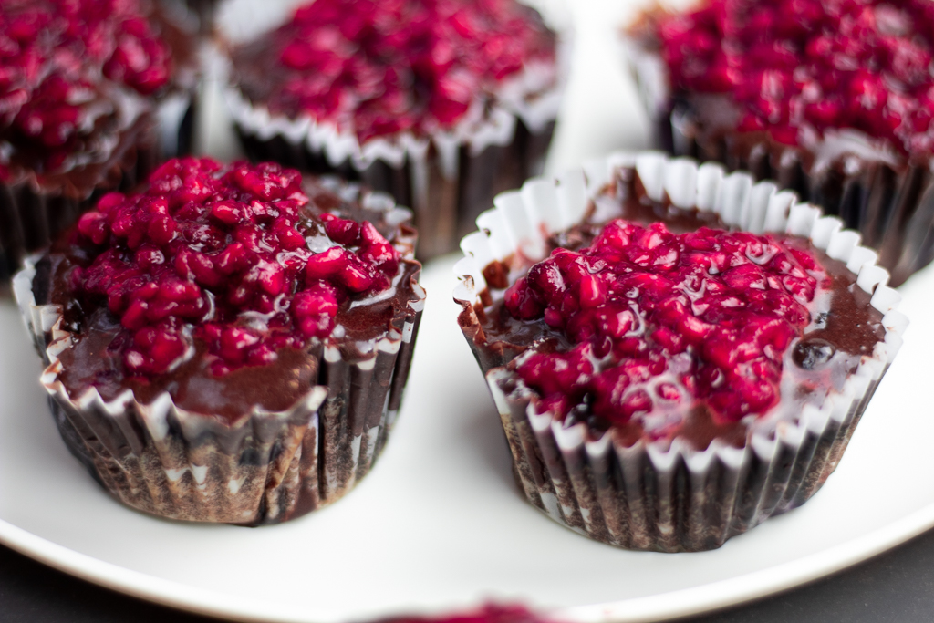 Chocolate Blueberry Paleo Cupcakes with chocolate ganache and raspberry topping