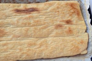 Gluten-free flatbread on a pan