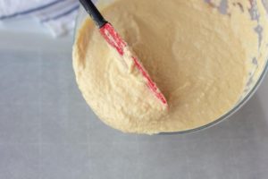 adding the dough to a cookie sheet